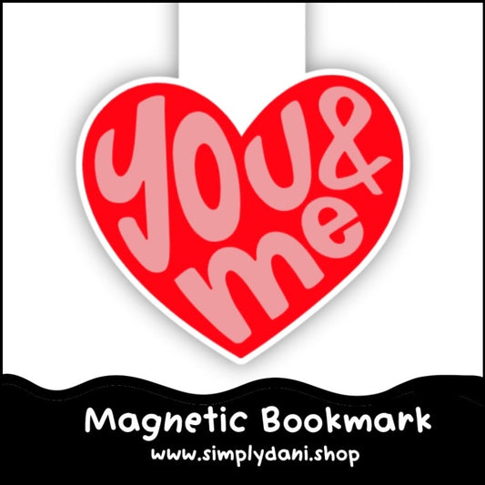 Heart-shaped magnetic bookmark with 'YOU & ME' text on a white background